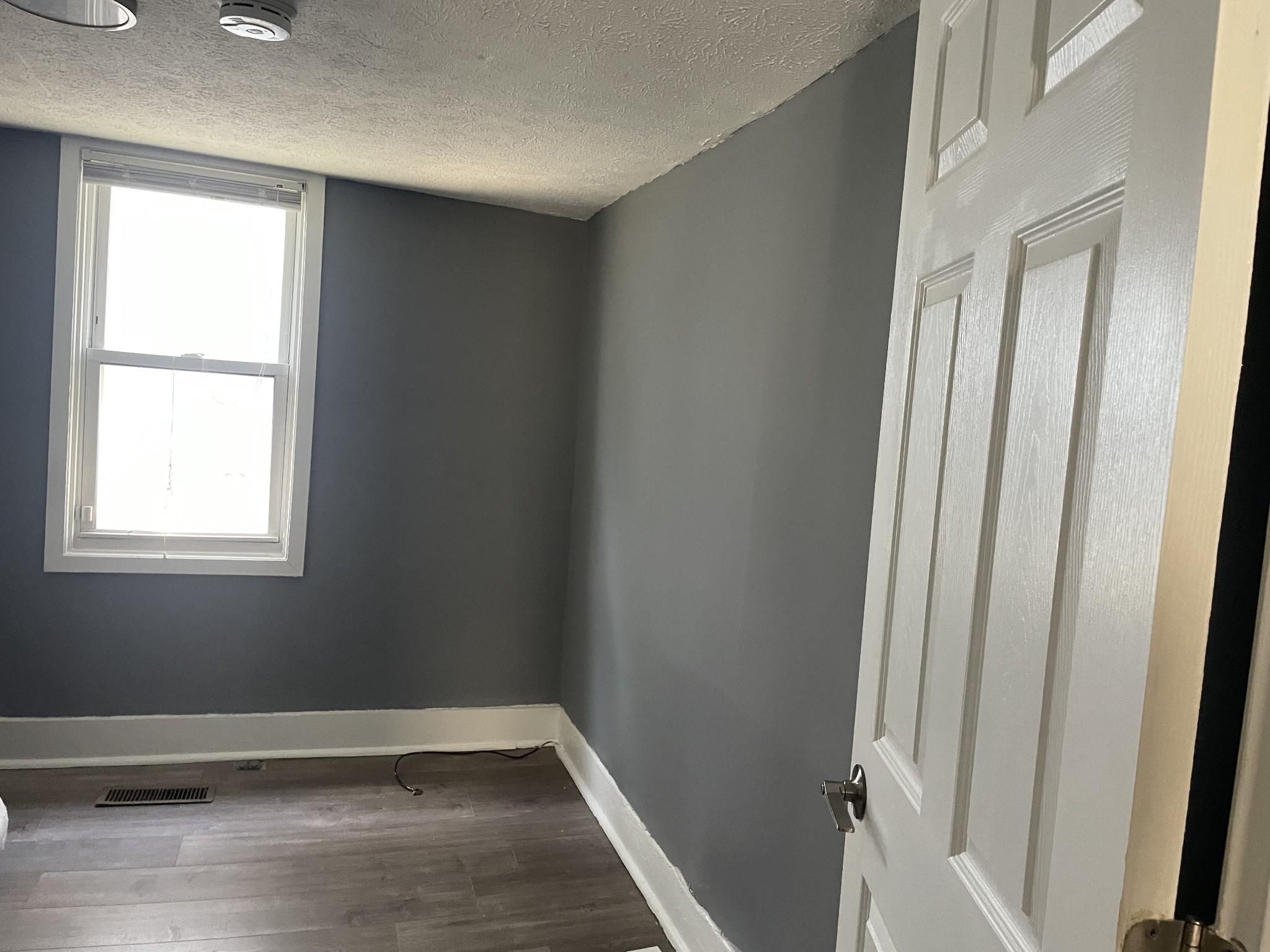914 Locklayer Street Nashville, TN 37208 - Photo 4 of 7 a view of an empty room and wooden floor
