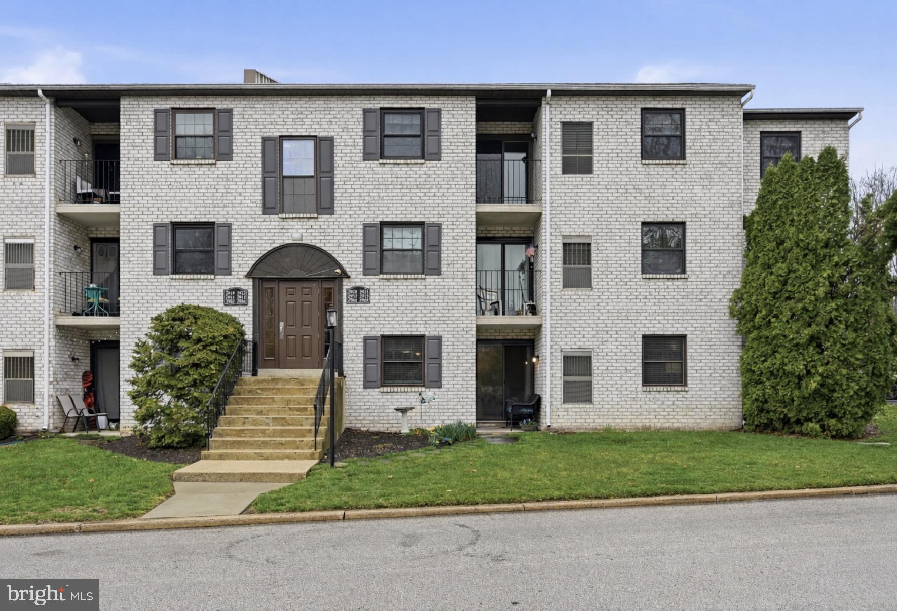 Charming brick apartment facade.