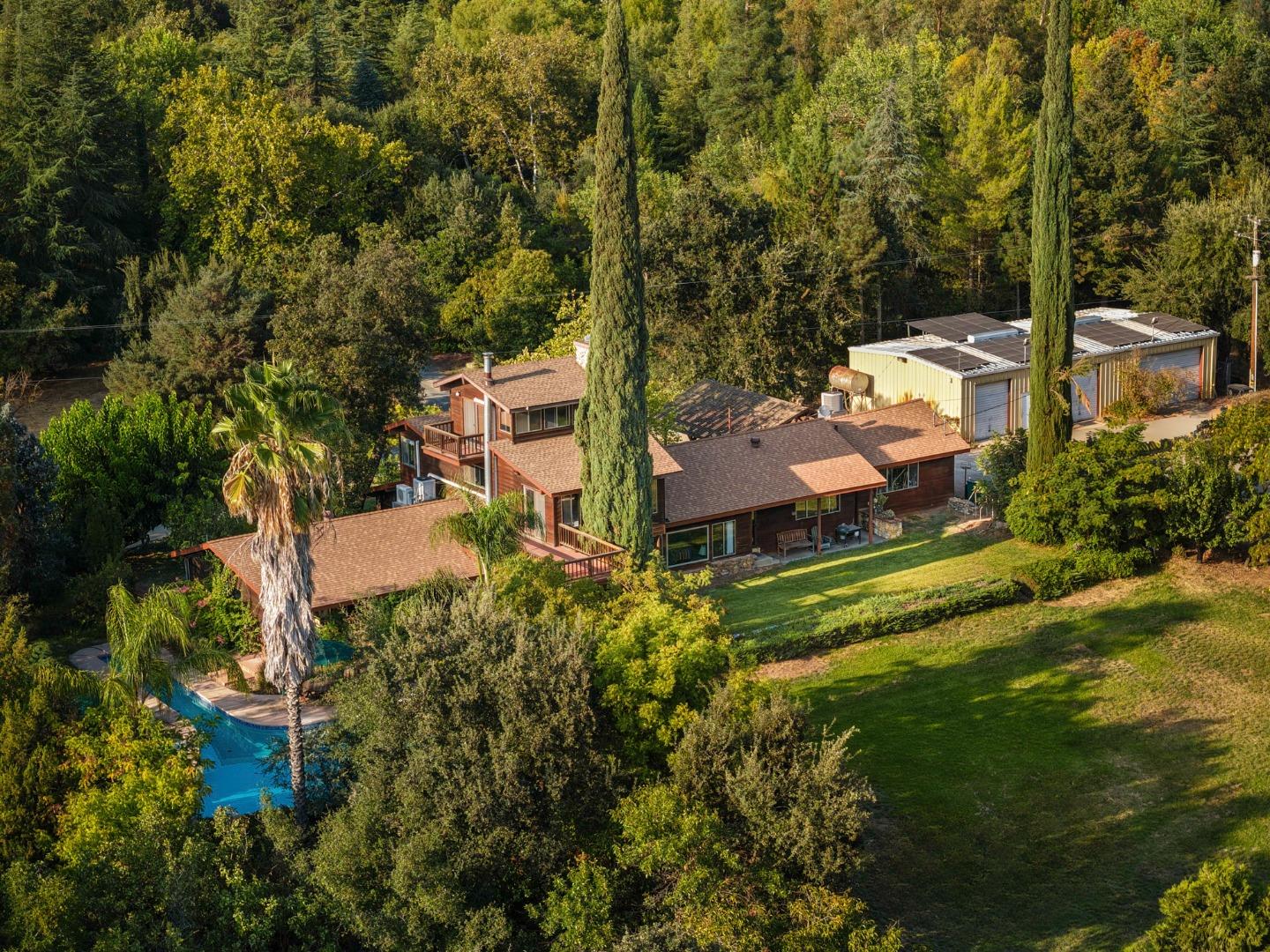 7555 Merced Falls Road Snelling, CA 95369 - Photo 26 of 77 an aerial view of a house with a yard basket ball court and outdoor seating