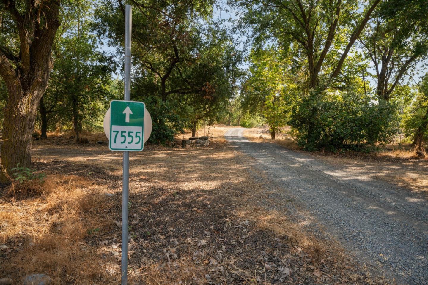 7555 Merced Falls Road Snelling, CA 95369 - Photo 67 of 77 a view of a street with trees in the background
