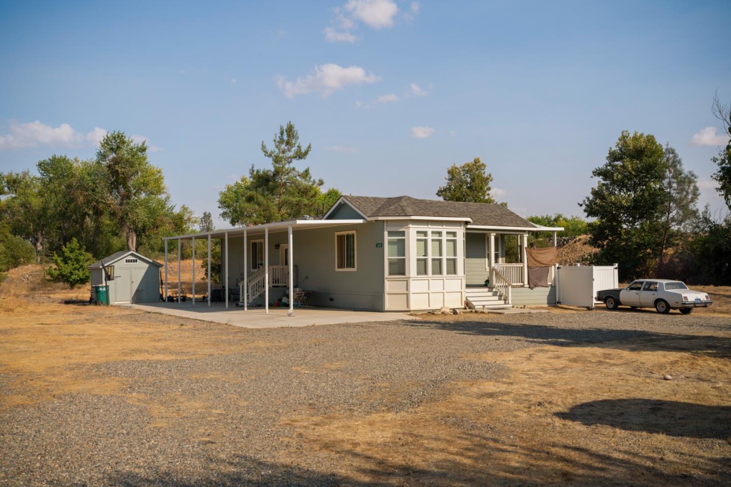 7555 Merced Falls Road Snelling, CA 95369 - Photo 69 of 77 a front view of a house with garden