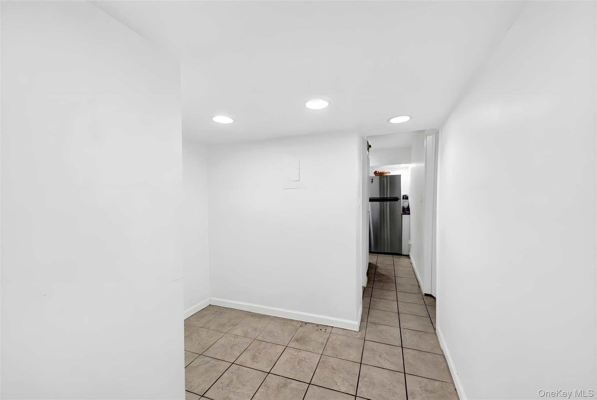 1456 Boston Post Road, Unit K2 Larchmont, NY 10538 - Photo 14 of 27 a view of a kitchen with a refrigerator and a sink