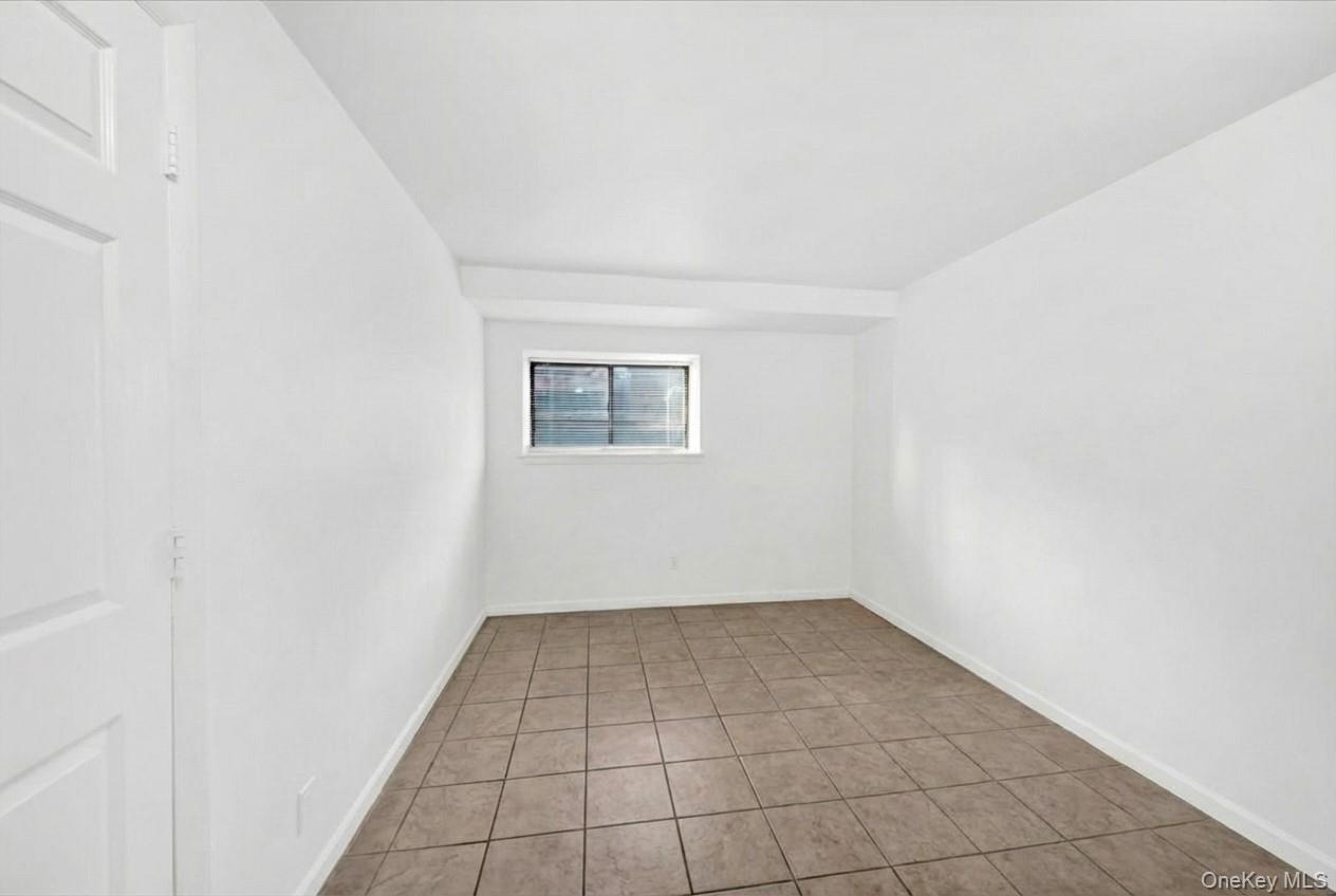 1456 Boston Post Road, Unit K2 Larchmont, NY 10538 - Photo 21 of 27 wooden floor in a empty room