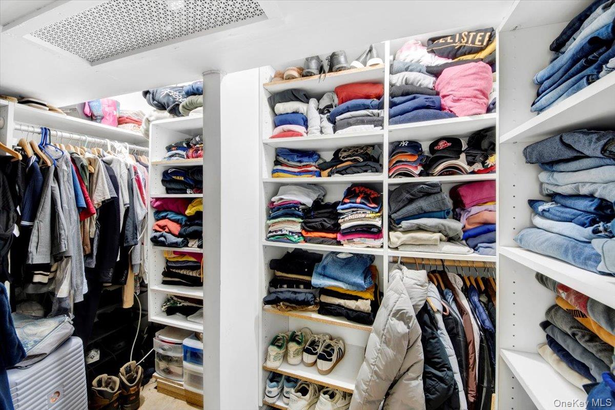 1456 Boston Post Road, Unit K2 Larchmont, NY 10538 - Photo 25 of 27 a view of walk in closet with clothes and shoes