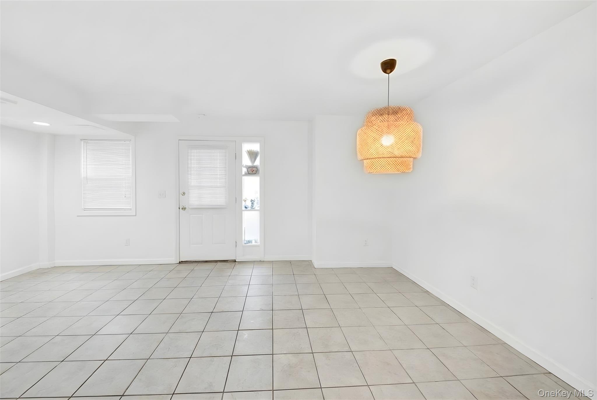 1456 Boston Post Road, Unit K2 Larchmont, NY 10538 - Photo 9 of 27 an empty room with kitchen view