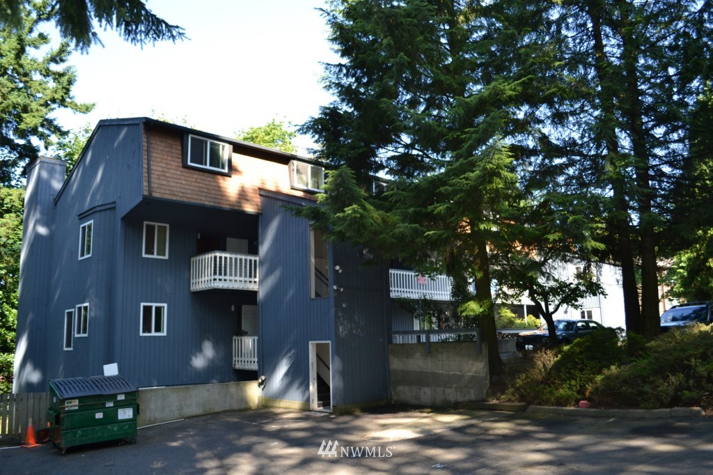 15801 4th Avenue South Burien, WA 98148 - Photo 2 of 2 a front view of a house with a yard