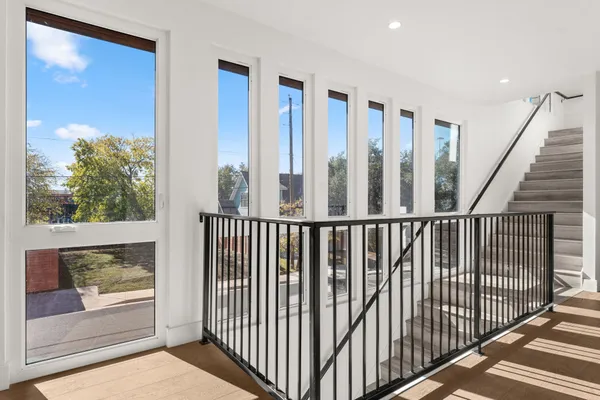 a view of staircase with rug floor