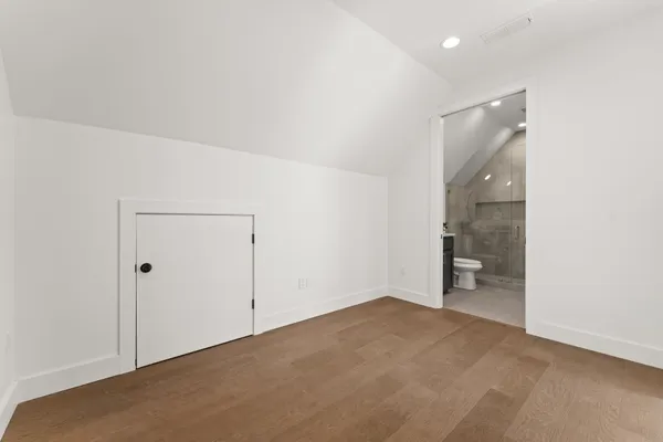 an empty room with a bathroom