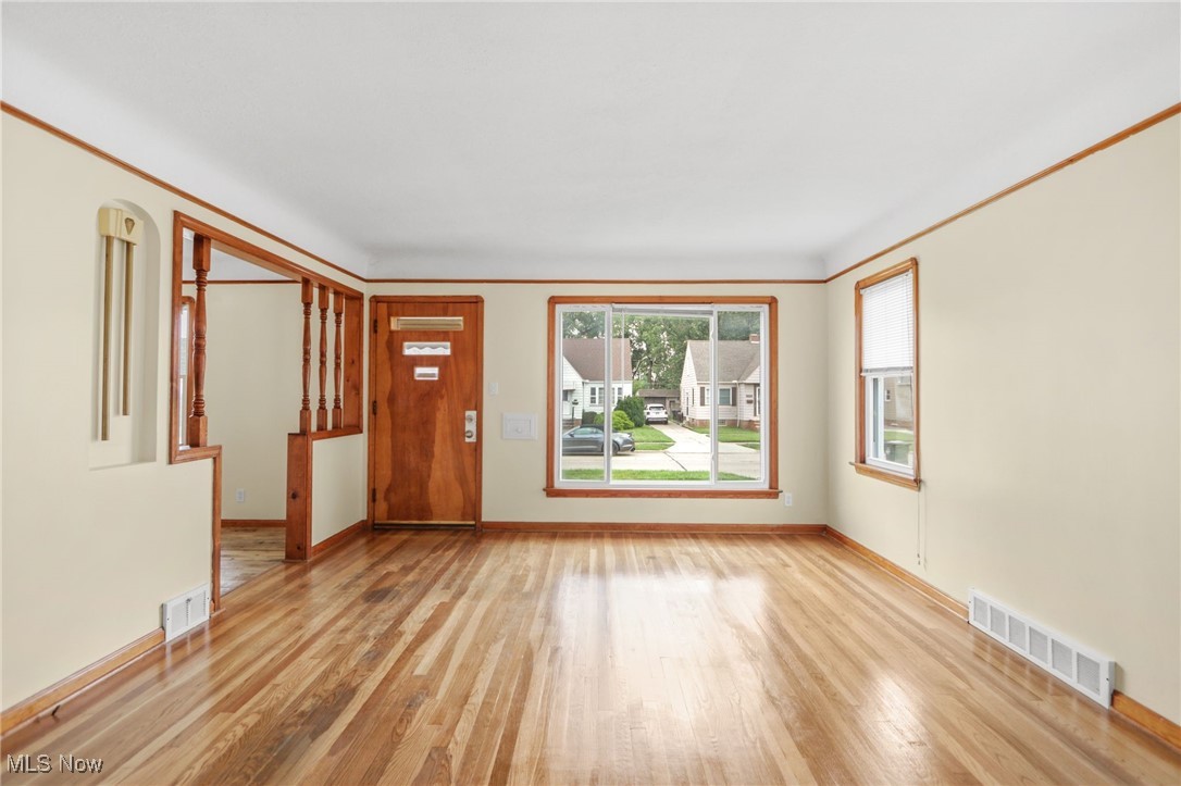 3205 George Avenue Cleveland, OH 44134 - Photo 4 of 32 Unfurnished living room featuring light wood-style floors