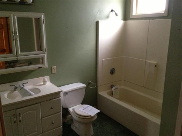 4 Assumption Avenue Worcester, MA 01606 - Photo 11 of 13 a bathroom with a sink toilet and shower