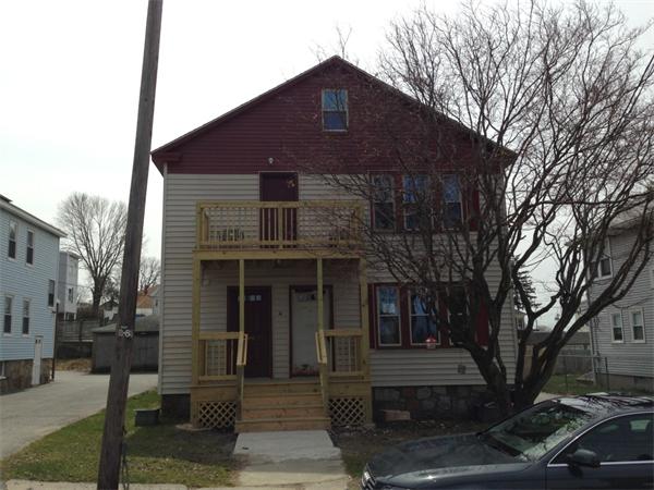 4 Assumption Avenue Worcester, MA 01606 - Photo 2 of 13 a front view of a house with a tree