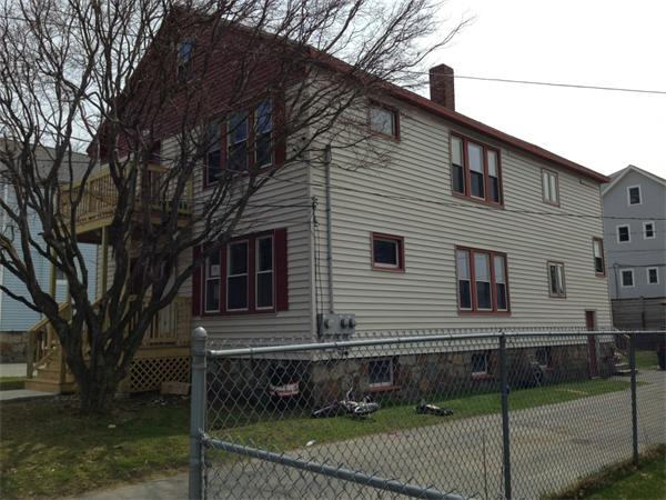 4 Assumption Avenue Worcester, MA 01606 - Photo 3 of 13 a view of a house with a yard