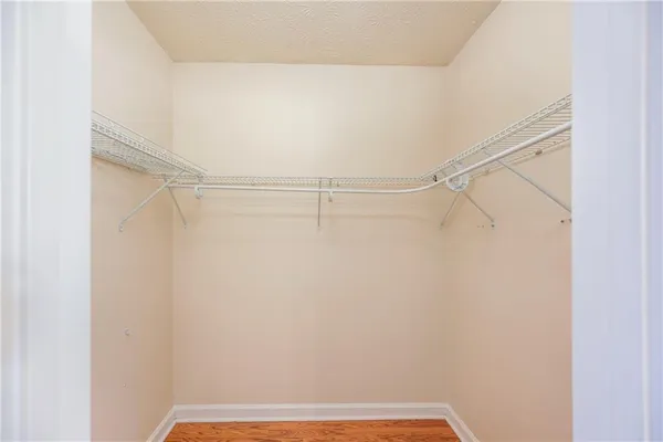 a view of a room with racks on the wall