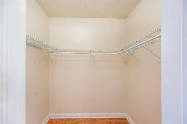 a view of a room with racks on the wall