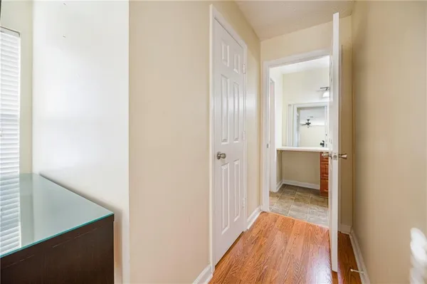a view of a bathroom from a hallway