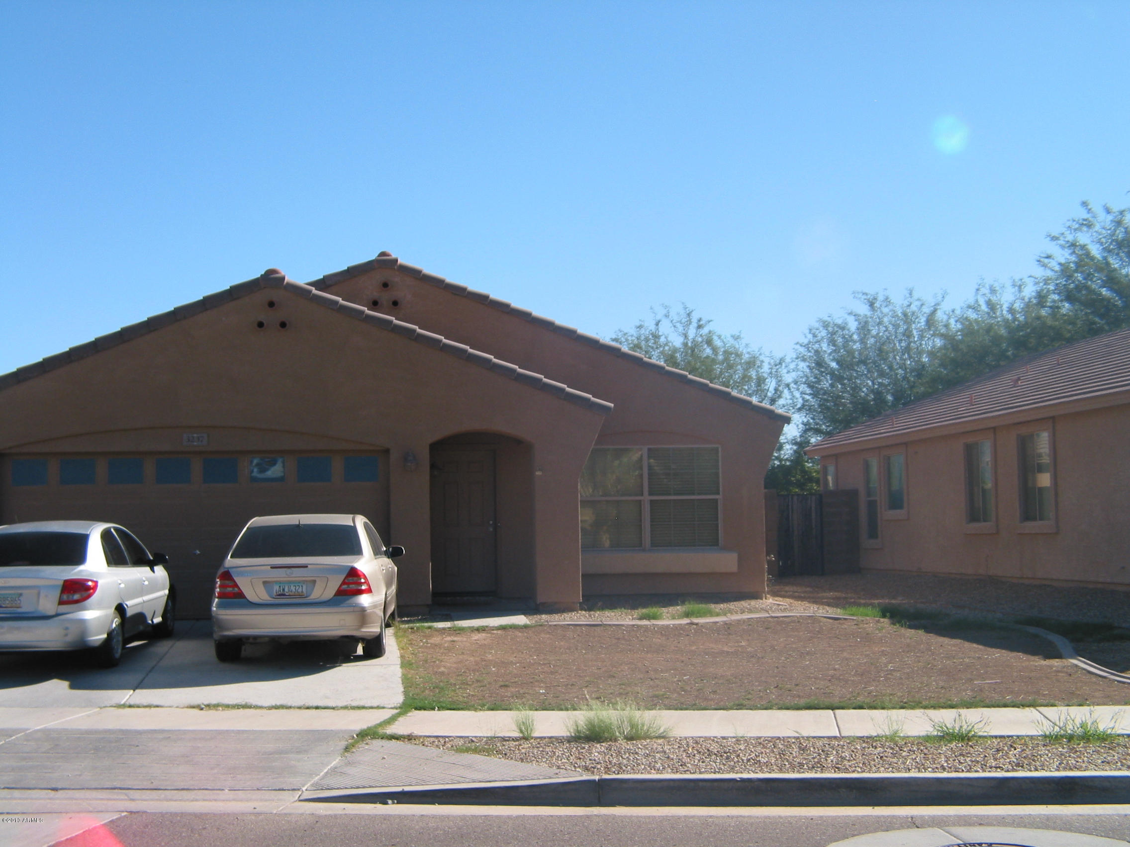 3237 West Alta Vista Road Phoenix, AZ 85041 - Photo 1 of 14 front of home