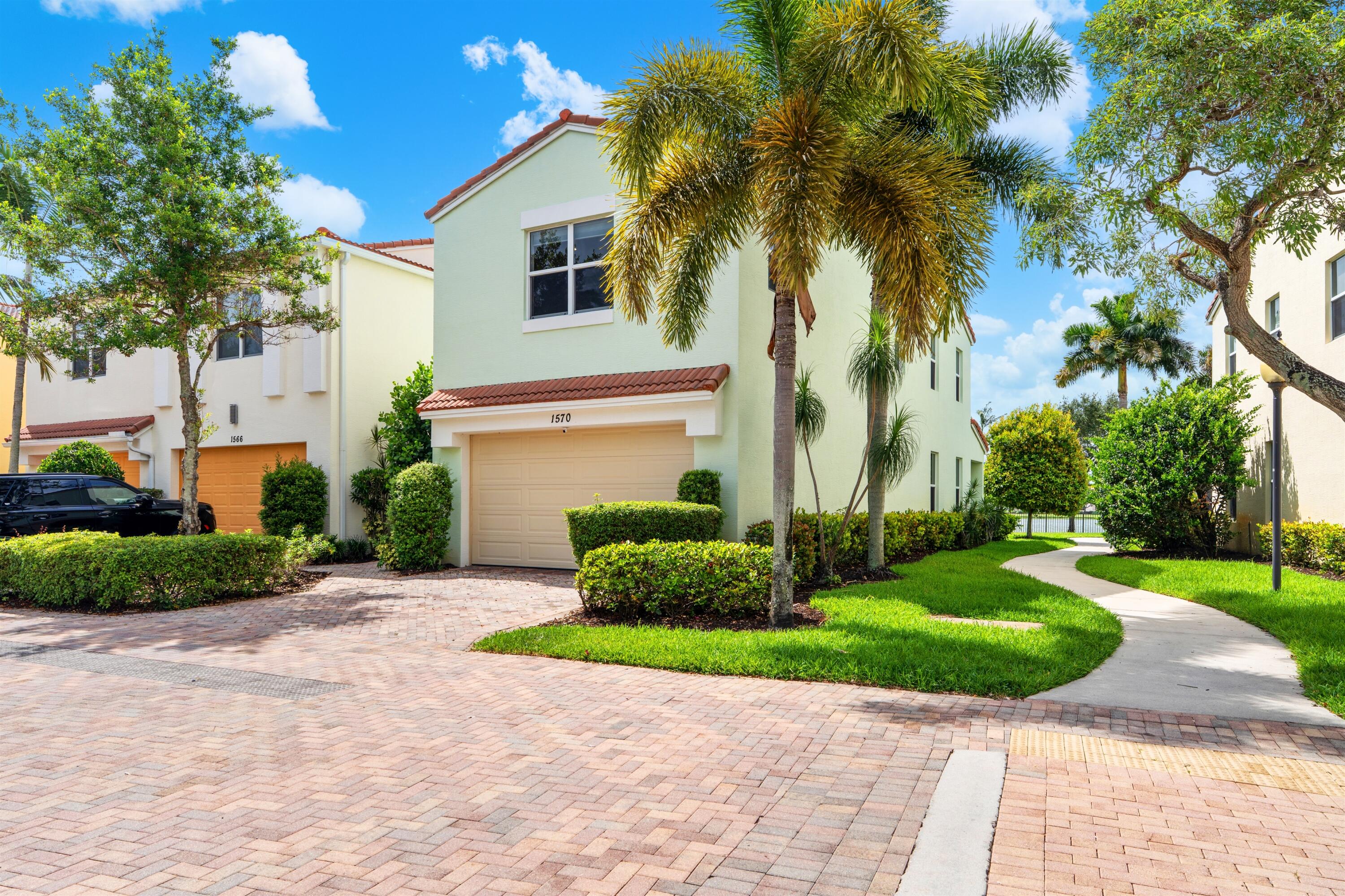 1570 Northwest 48th Place Boca Raton, FL 33431 - Photo 1 of 30 FRONT_ANGLE_LEFT