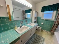2375 Burnham Road Akron, OH 44333 - Photo 20 of 39 Bathroom featuring double sink