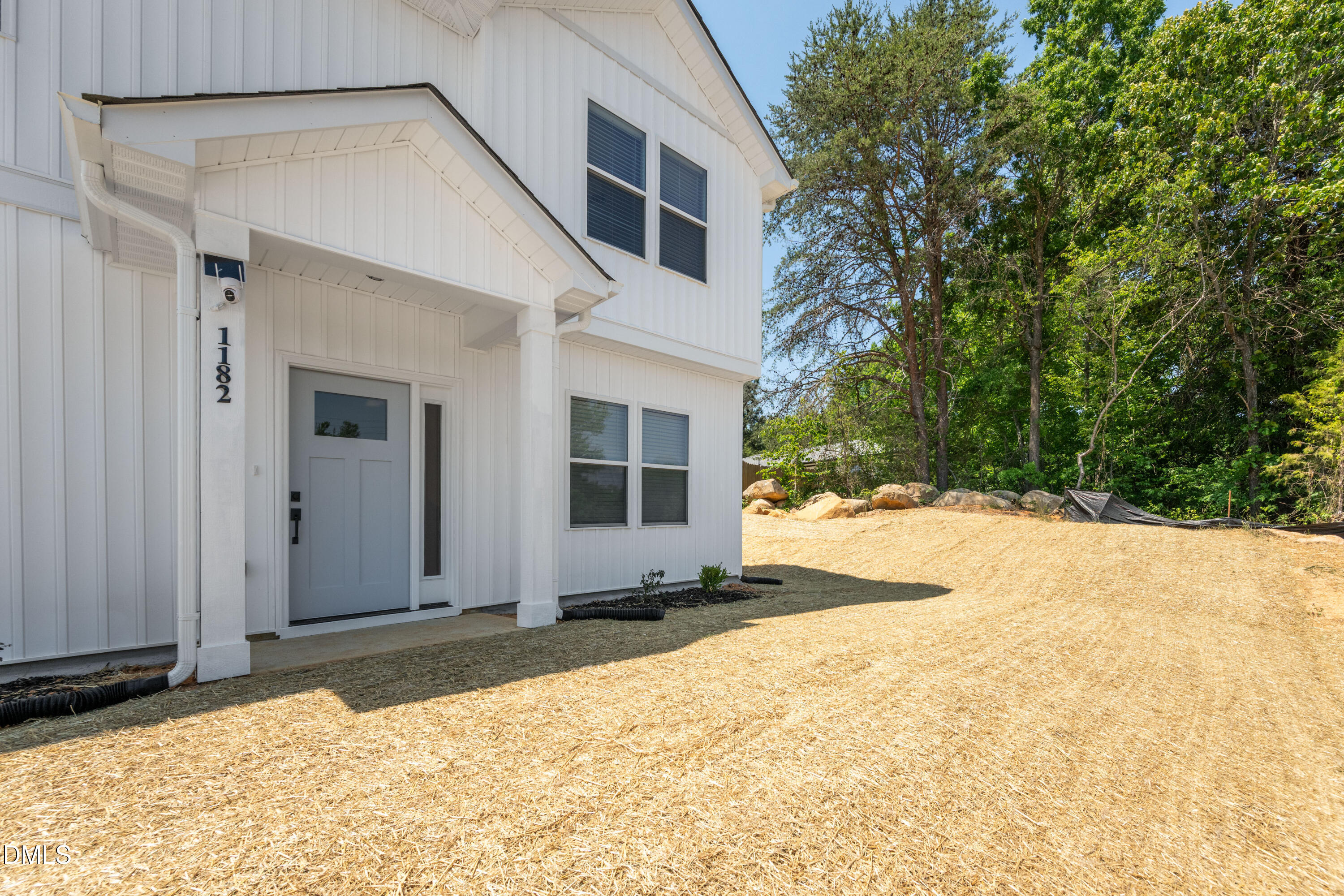 1182 Hurdle Mills Road Roxboro, NC 27573 - Photo 5 of 45 a front view of house with yard