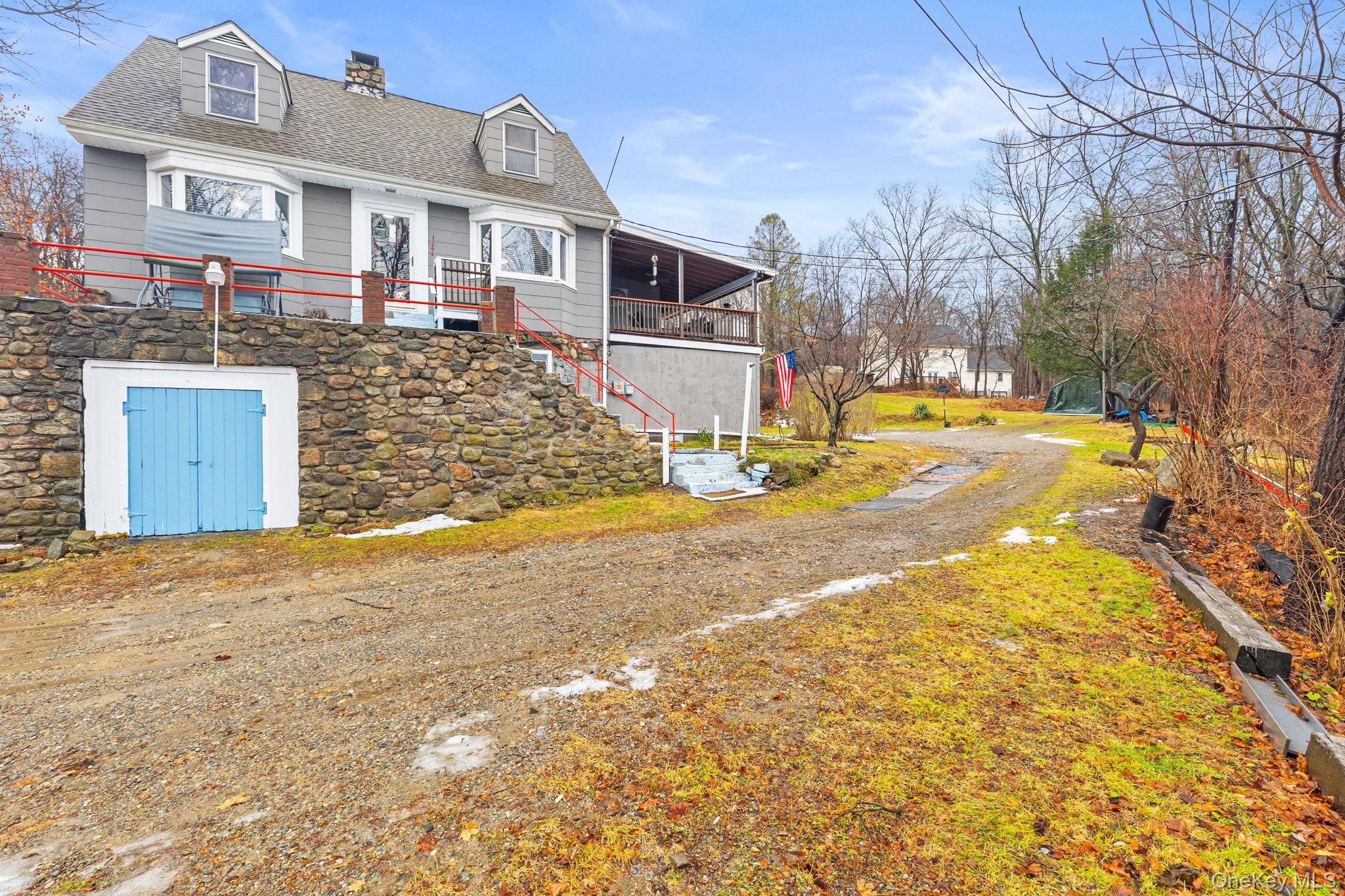 11 Cross Creek Road Cold Spring, NY 10516 - Photo 5 of 43 View of front of property with stairs, a chimney, and a shingled roof