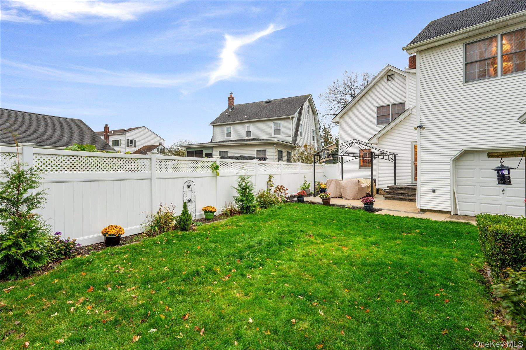 51 Marvin Street Patchogue, NY 11772 - Photo 4 of 25 a view of a house with a yard