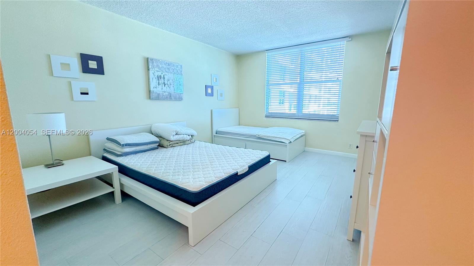 2501 South Ocean Drive, Unit 820 Hollywood, FL 33019 - Photo 7 of 12 a room with a bed and a window