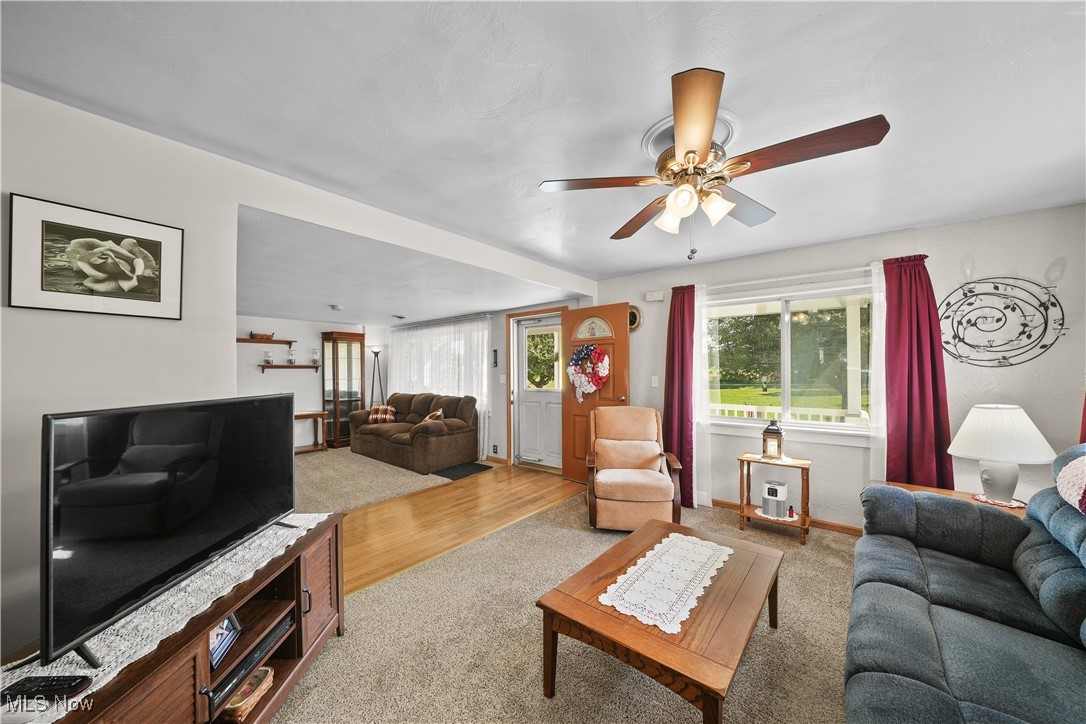 6677 Fee Road Rome, OH 44085 - Photo 8 of 39 Living room featuring light hardwood / wood-style flooring and ceiling fan