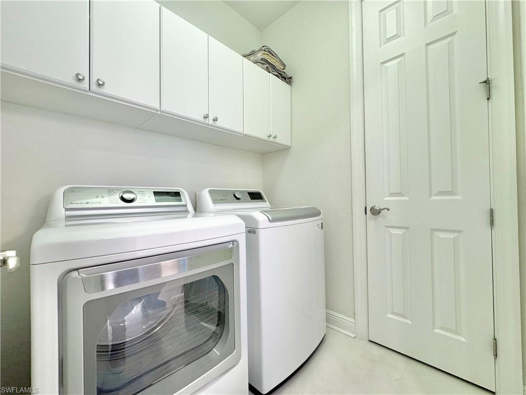 12667 Biscayne Court Naples, FL 34105 - Photo 28 of 39 a utility room with dryer and washer