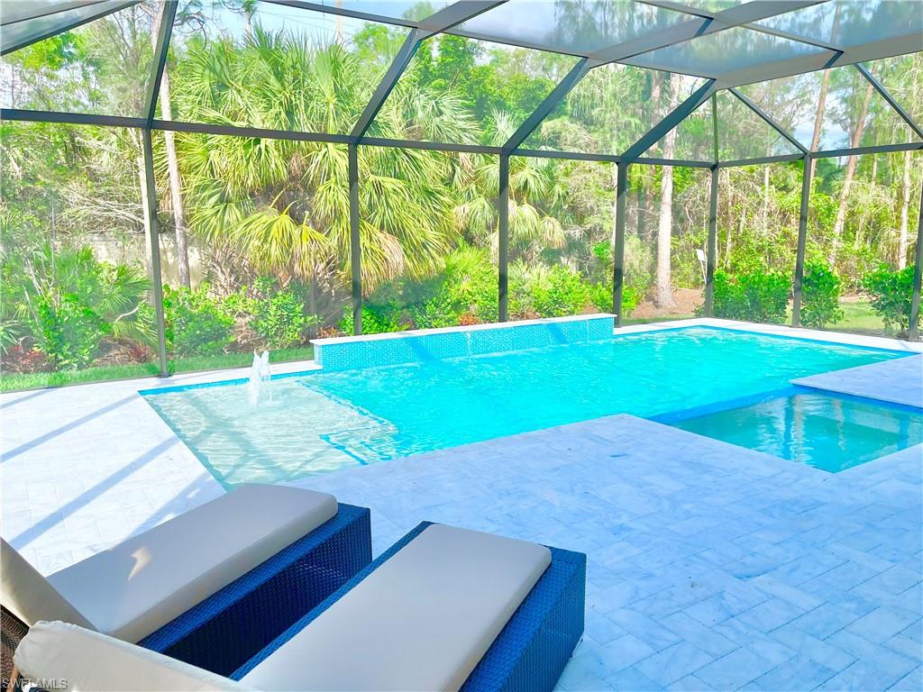 12667 Biscayne Court Naples, FL 34105 - Photo 34 of 39 a view of an outdoor space