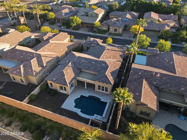 an aerial view of multiple houses with a terrace