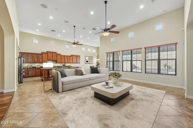 a living room with furniture and a table