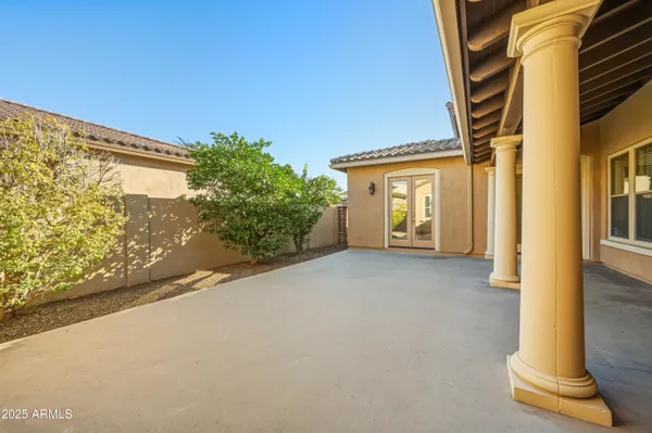 a view of a swimming pool with a patio