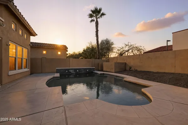 a view of a house with a swimming pool