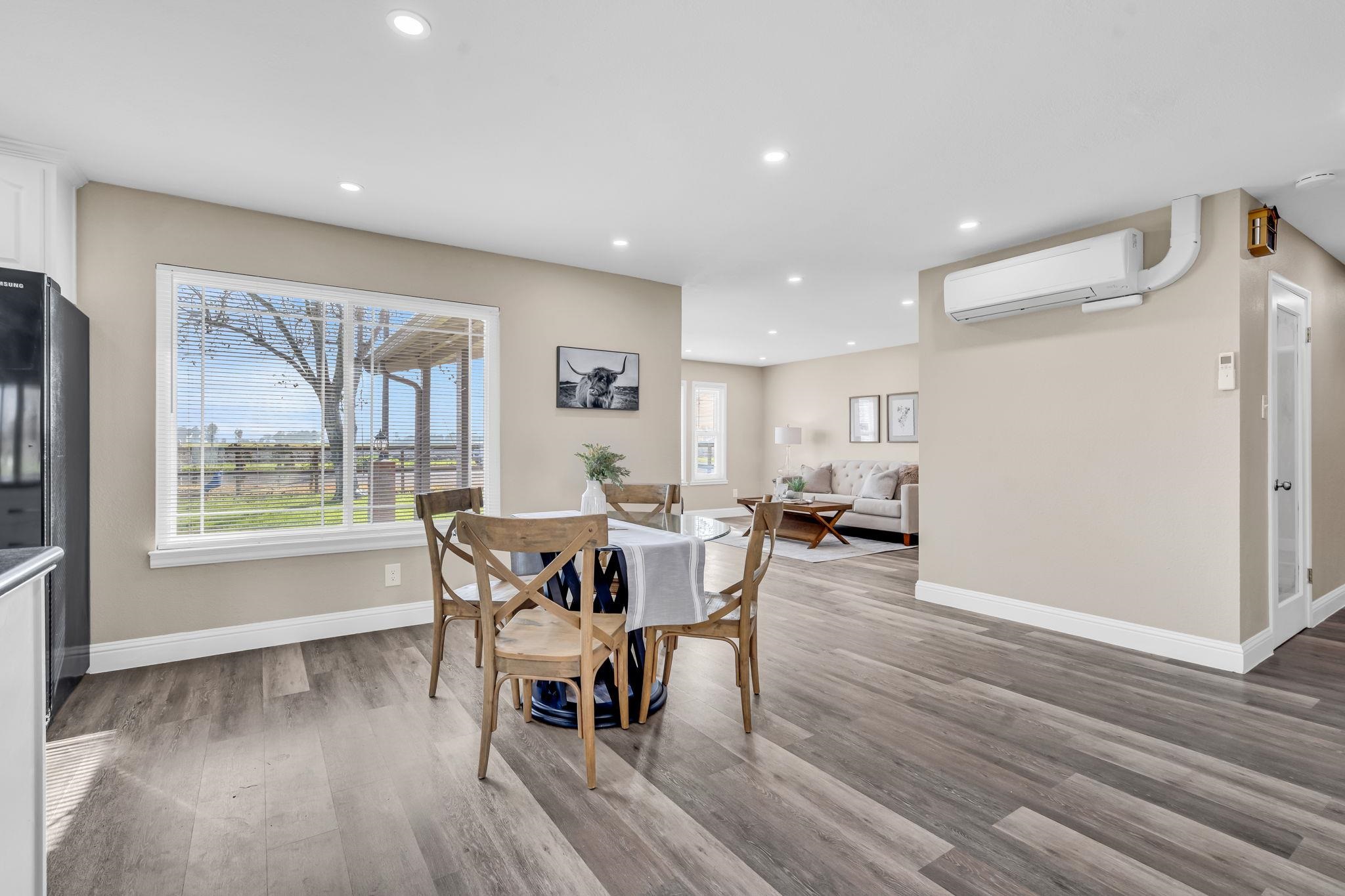 1660 Sunset Road Brentwood, CA 94513 - Photo 11 of 45 Dining area featuring light wood-style floors, recessed lighting, and a mini split for heating / cooling
