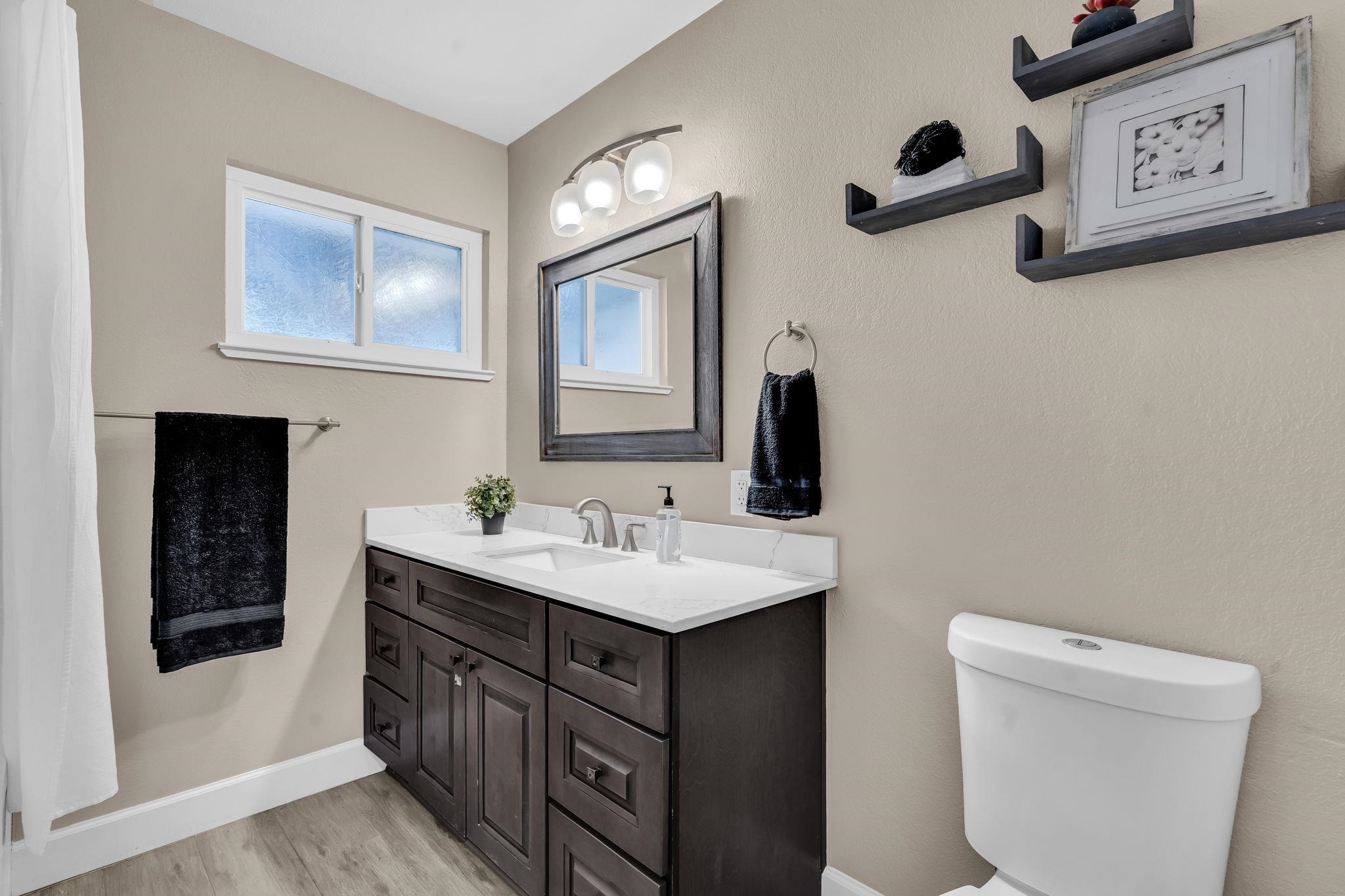 1660 Sunset Road Brentwood, CA 94513 - Photo 22 of 45 Full bath featuring vanity and light wood-style floors