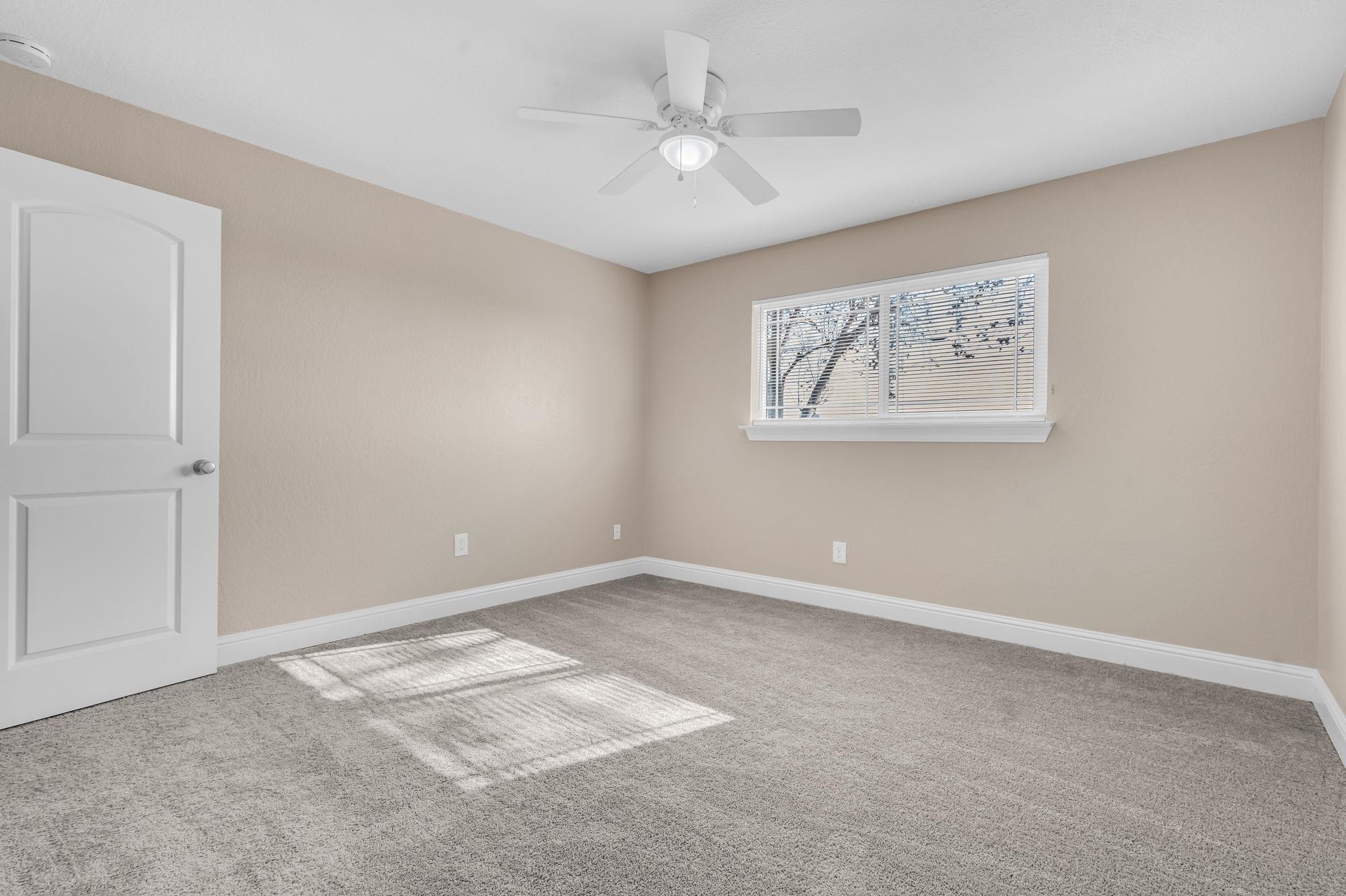 1660 Sunset Road Brentwood, CA 94513 - Photo 24 of 45 Unfurnished room with light carpet, ceiling fan, and a smoke detector