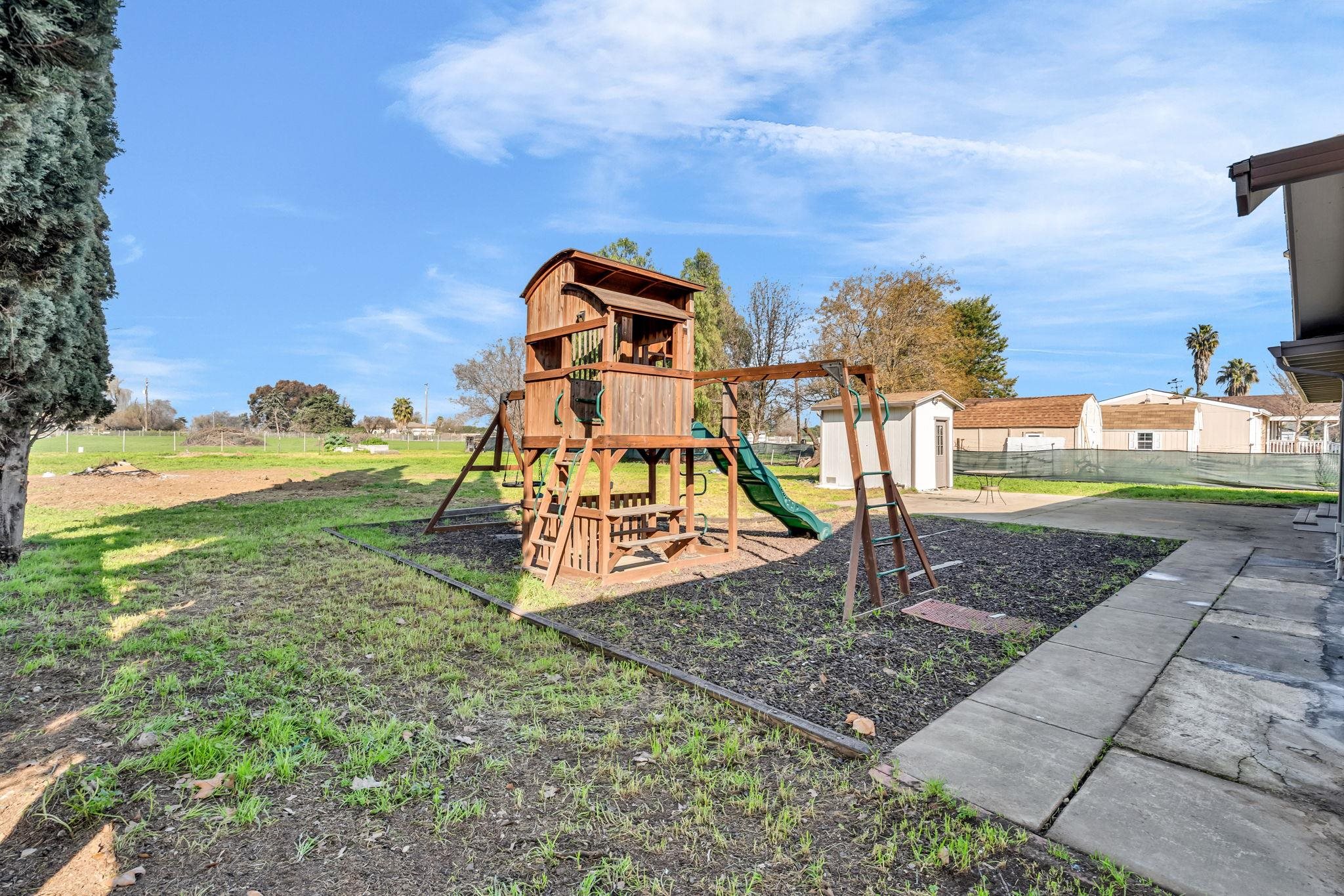 1660 Sunset Road Brentwood, CA 94513 - Photo 36 of 45 View of playground featuring a storage shed