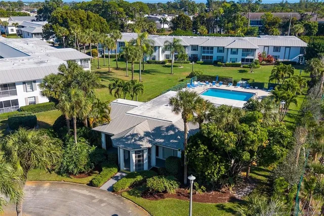 an aerial view of a house with a garden