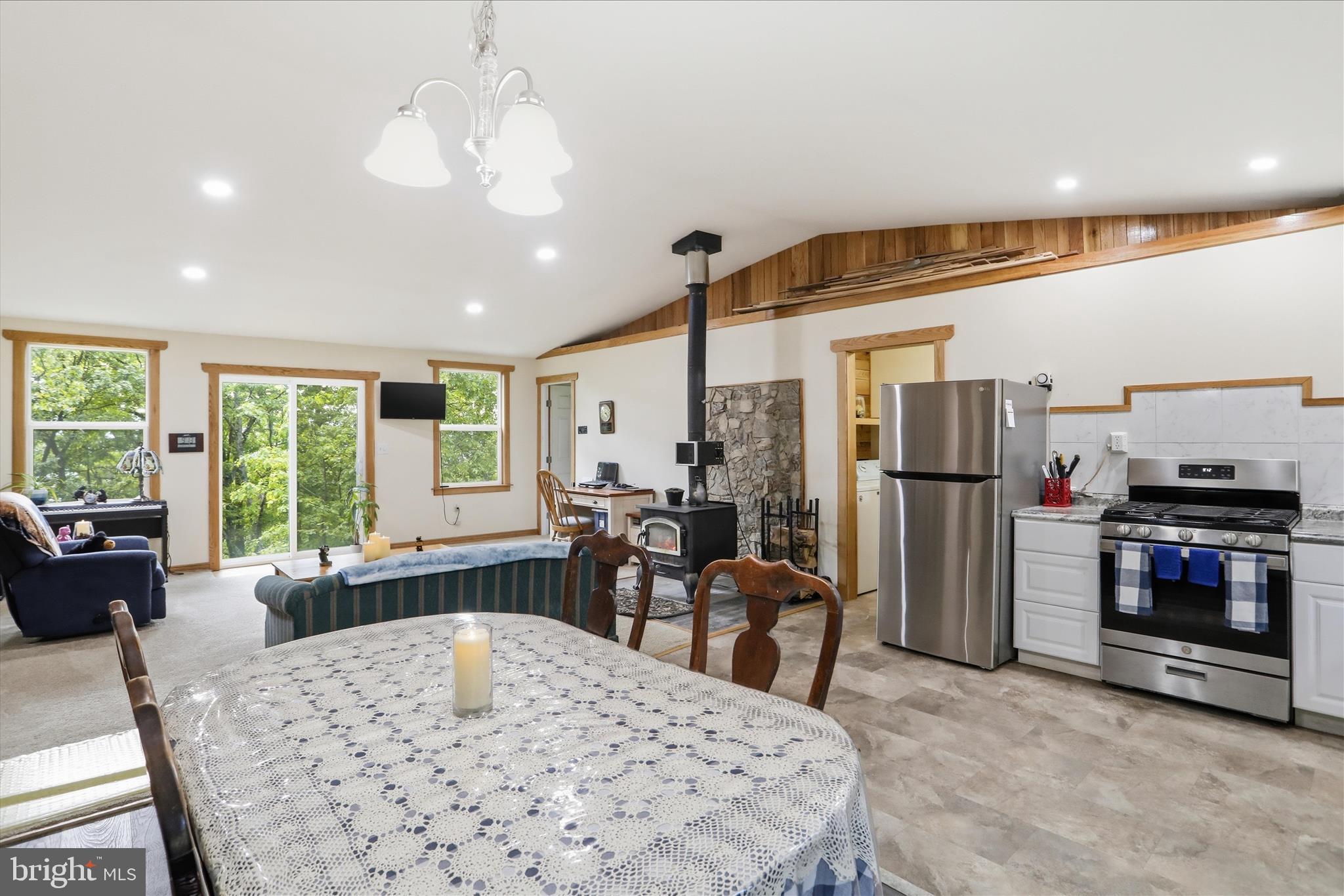 936 Johnny Cake Road Great Cacapon, WV 25422 - Photo 8 of 33 a view of a dining room with furniture