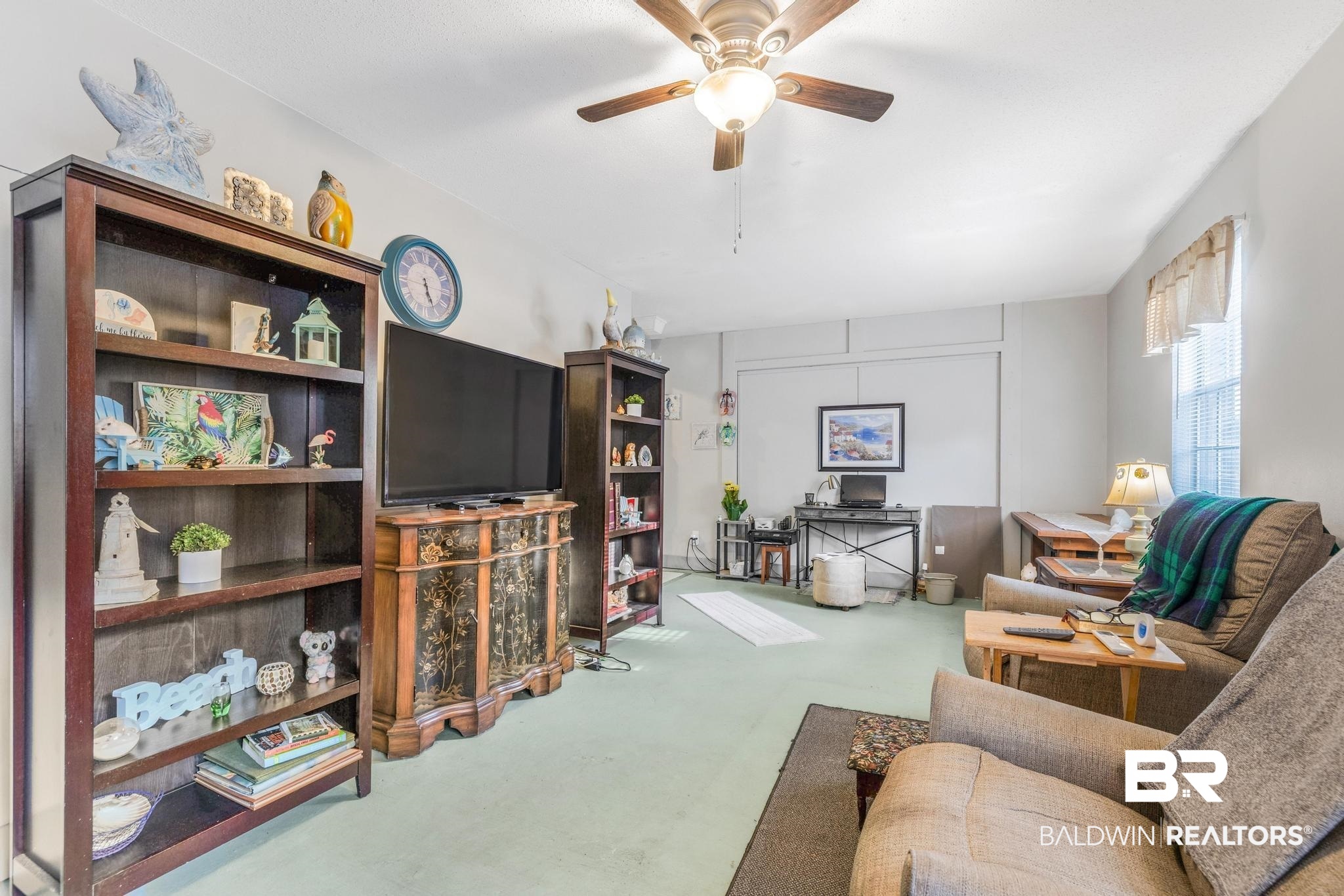 2573 E Road Mobile, AL 36693 - Photo 23 of 45 Living area featuring ceiling fan