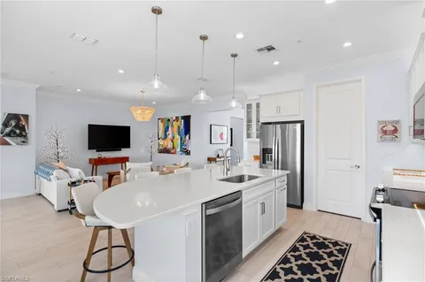 $549,999 | 4620 Arboretum Circle, Unit 201, Naples, FL 34112