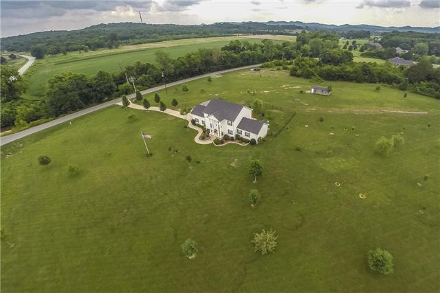 50 Greenvale Road Milton, TN 37118 - Photo 19 of 20 a view of a lake with a big yard