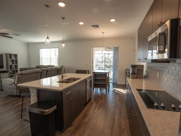 a bedroom with a bed and a cabinet