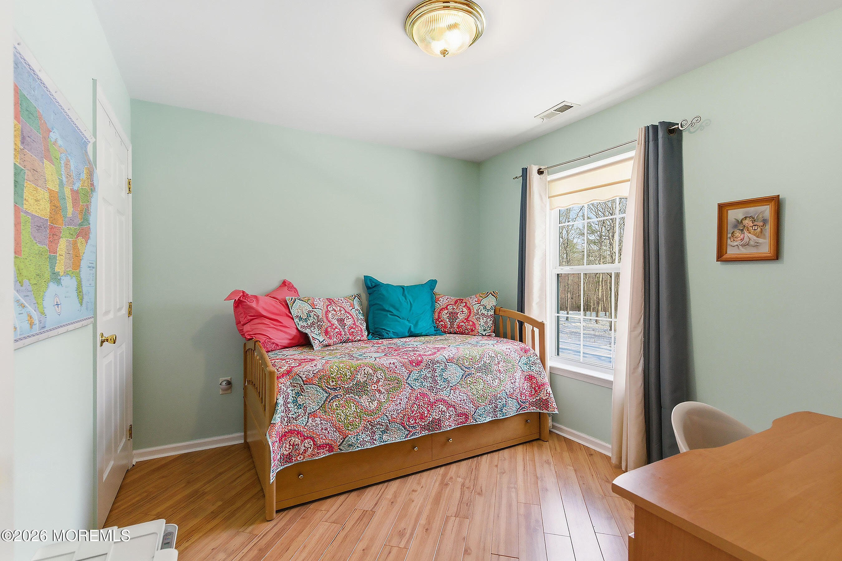 9 Kindling Way Jackson, NJ 08527 - Photo 26 of 33 a bedroom with a bed and wooden floor
