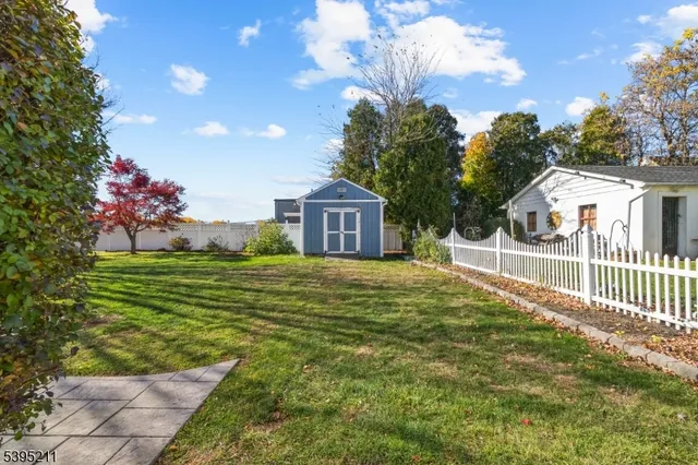 a house view with a garden space
