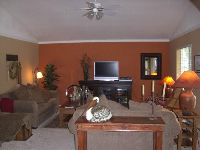 394 Evergreen Drive Rifle, CO 81650 - Photo 4 of 9 a room with furniture and chandelier