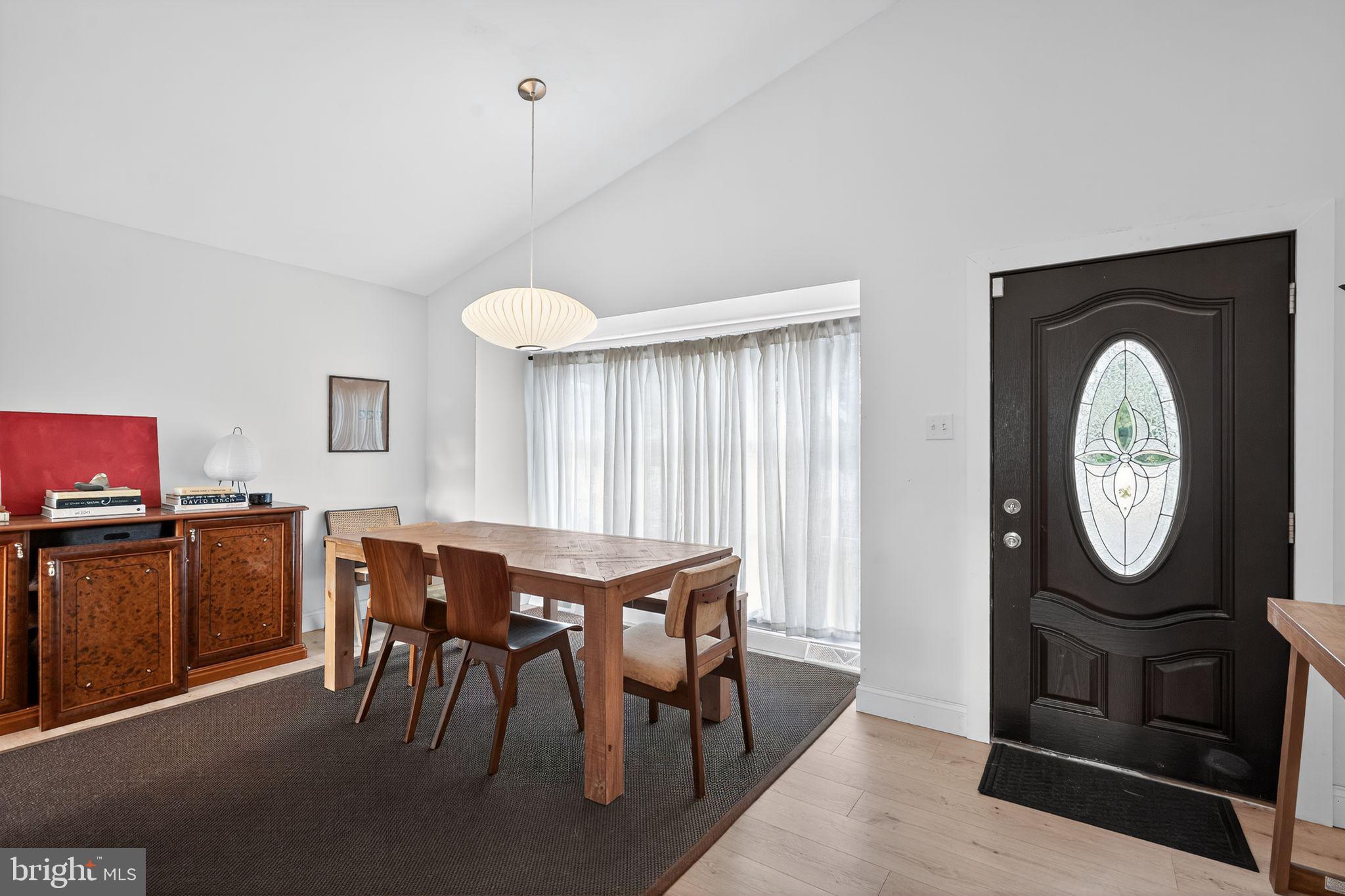 333 Jackson Road Mantua, NJ 08051 - Photo 17 of 34 a view of a dining room with furniture and a chandelier