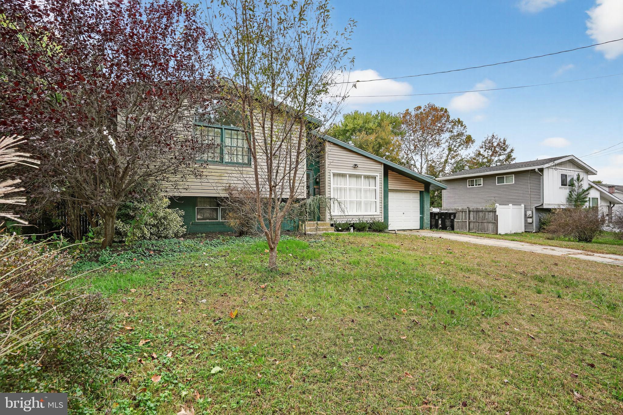 333 Jackson Road Mantua, NJ 08051 - Photo 2 of 34 a view of a house with backyard and a tree