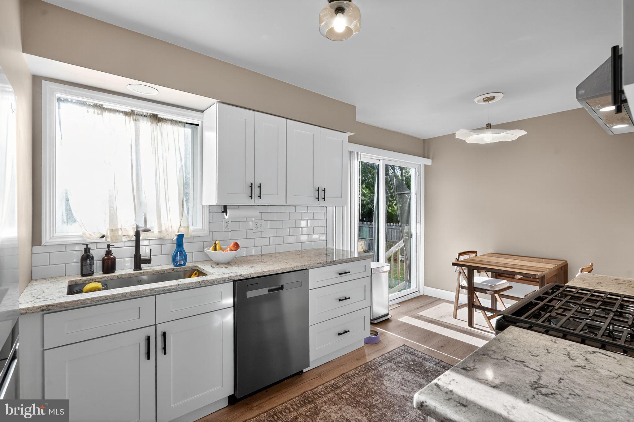 333 Jackson Road Mantua, NJ 08051 - Photo 22 of 34 a kitchen with a sink appliances and cabinets