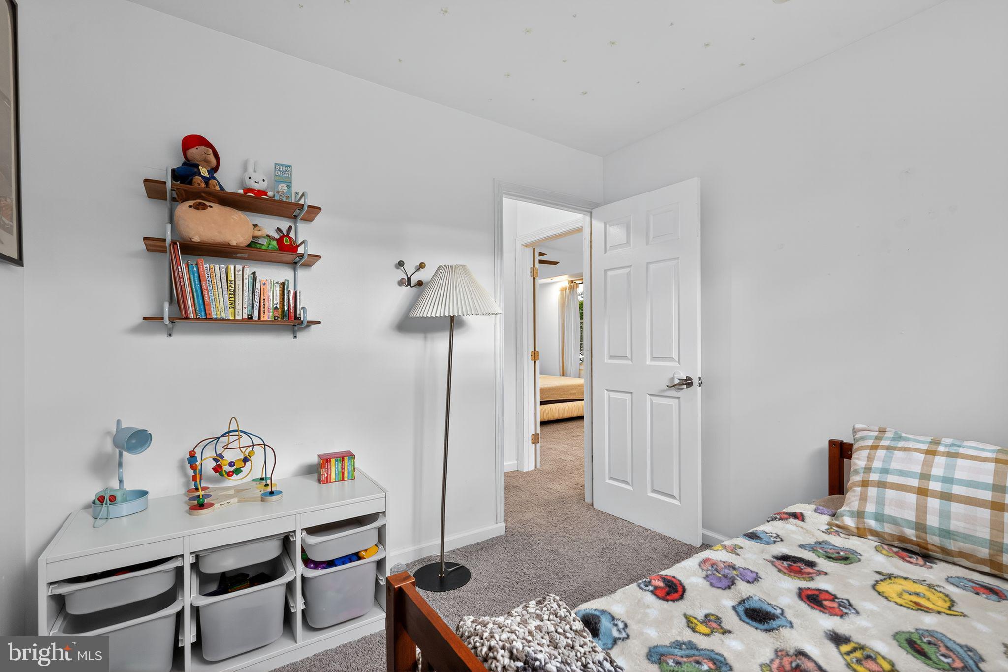 333 Jackson Road Mantua, NJ 08051 - Photo 28 of 34 a bedroom with a bed and wooden floor
